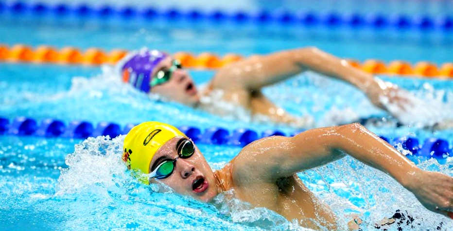 Stroke Rhythm Beneath the Blue Lane: When Swimming Relearns Itself from the Track Stroke Rhythm Beneath the Blue Lane: When Swimming Relearns Itself from the Track